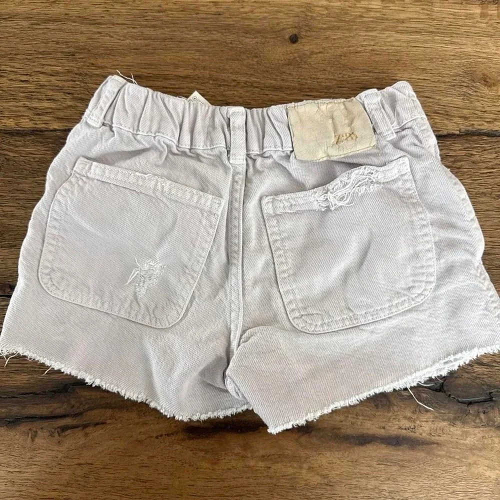 Zara white denim shorts with button detail, size 8